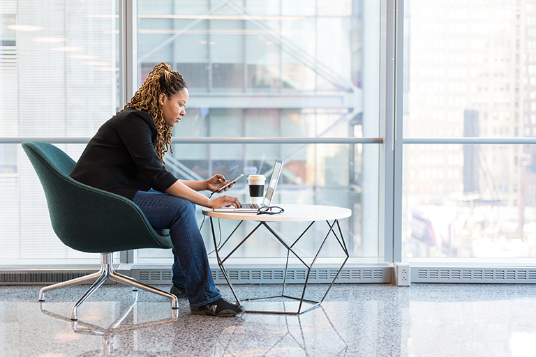 A woman receiving a telehealth counseling session