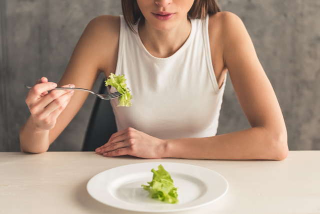 causes for hormonal imbalance in woman - eating disorder - light salad