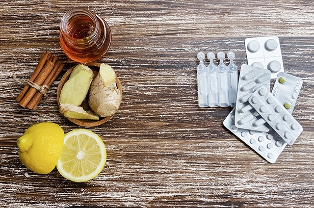 Lemon, ginger, and honey on the left with medications on the right