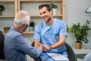 patient and doctor shaking hands 