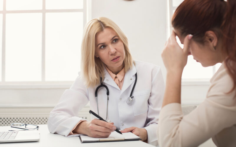 doctor talking to patient about semaglutide side effects