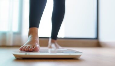 woman checking scale for zepbound weight loss results