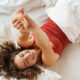 Young woman happy after waking up from good sleep