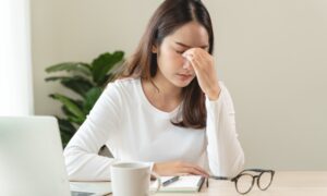 Young woman dealing with fatigue