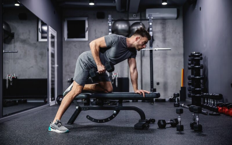 Man doing strength training at a gym