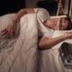 Young man peacefully asleep wearing a sleep apnea machine