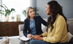 Woman talking to a therapist