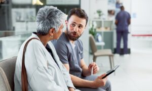 Doctor discussing with a older woman patient