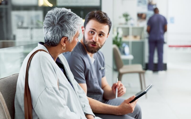 Doctor discussing with a older woman patient