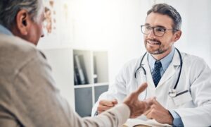 Consultation between a man and a doctor