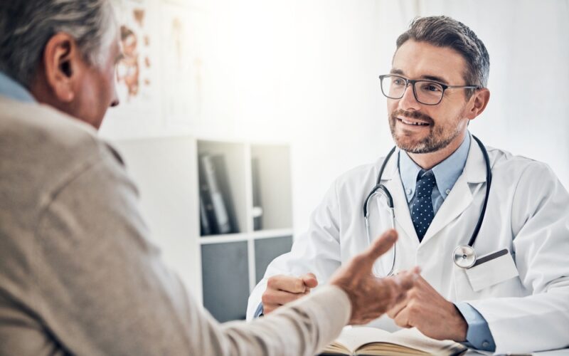 Consultation between a man and a doctor