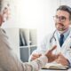Consultation between a man and a doctor