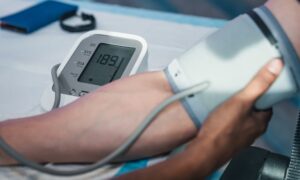 Up close image of someone getting their blood pressure checked