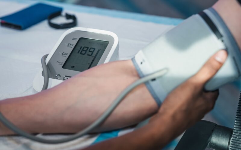 Up close image of someone getting their blood pressure checked