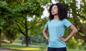 Woman practicing mental clarity in a park