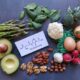 Foods shown that are rich in glutathione alongside a card that has glutathione written down