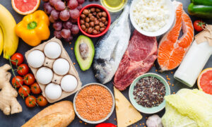 close up of healthy and nutritious foods laid out along a table