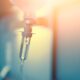 Vitamin IV drip infusion therapy in a medical setting. Close-up of intravenous therapy with liquid nutrients for health and wellness.”