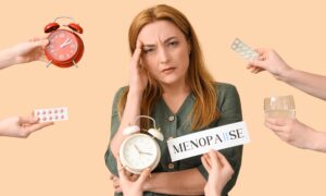 Mature woman experiencing menopause and hands with things on beige background