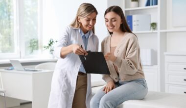Professional doctor working with patient in hospital talking about DHEA
