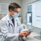 Doctor_Reviewing_Lab_Results_In_Hospital