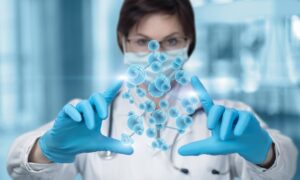 researcher scientist female visualizing hormone molcule with her hands