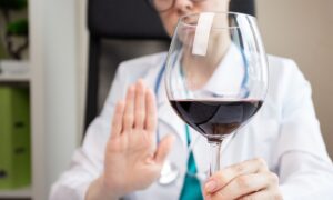 wegovy and alcohol,doctor shows hand rejection of a alcoholic drinks