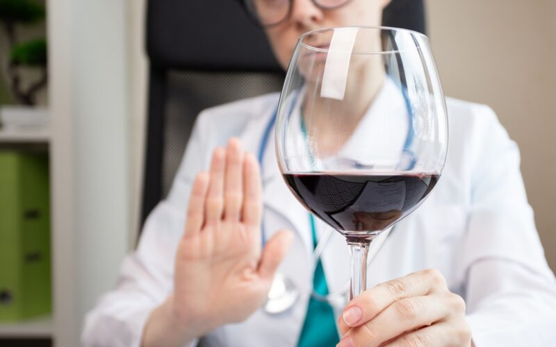 wegovy and alcohol,doctor shows hand rejection of a alcoholic drinks