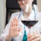 wegovy and alcohol,doctor shows hand rejection of a alcoholic drinks