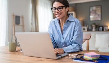 Heally Telemedicine. Young woman doctor working at home office, private general practitioner, healthcare and medical female worker using laptop computer for contact with senior patients Helping people online