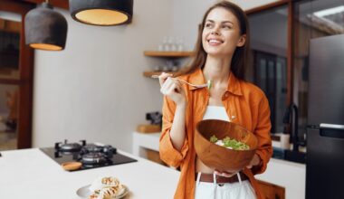 Woman enjoying a healthy salad as part of preparing for an NAD+ IV therapy session, highlighting the importance of light, balanced meals and proper nutrition before infusion for better energy and comfort.