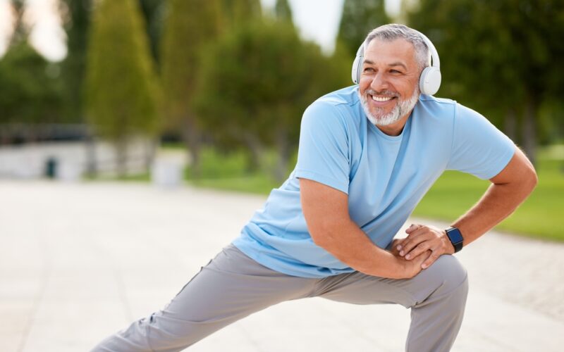 Healthy, happy older man exercising, representing the role of active lifestyle choices in supporting longevity and overall wellness, alongside potential benefits of methylene blue for healthy aging.