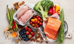 Wegovy diet food. Healthy low carbs products. Keto diet concept. Vegetables, fish, meat, nuts, seeds, berries, cheese on a white background, top view.