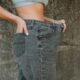 Tirzepatide and promoting diet, exercise, weight loss programs, or Medspa services, this image captures the triumph and motivation of achieving health and fitness goals.