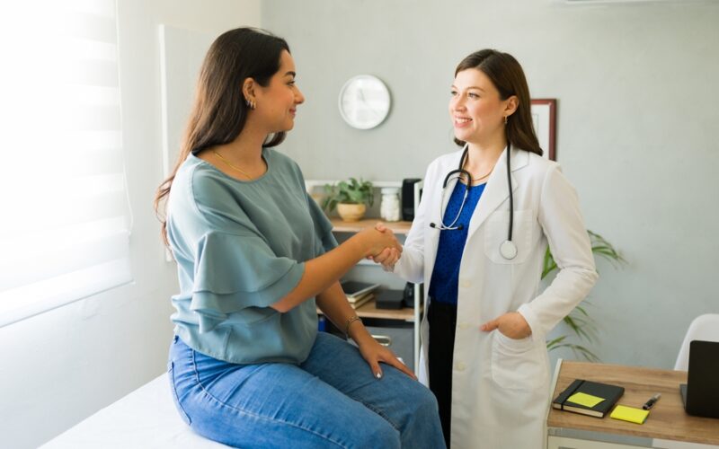 Woman on Wegovy weight loss medication consulting with her doctor about symptoms of fatigue.