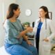 Woman on Wegovy weight loss medication consulting with her doctor about symptoms of fatigue.