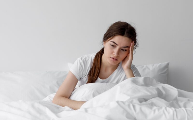 Woman woke up and realized she missed her Zepbound dose yesterday — representing concern or confusion about missing a medication dose.