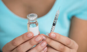 Person holding Wegovy needle and enjection learning how to properly store and use their weight loss medication correctly