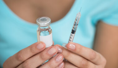 Person holding Wegovy needle and enjection learning how to properly store and use their weight loss medication correctly