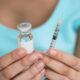 Person holding Wegovy needle and enjection learning how to properly store and use their weight loss medication correctly