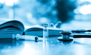 Image Of a Needle and Book Showing How to Inject a Weight Loss Pen Properly