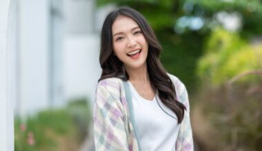 Smiling woman outdoors representing informed choices between peptides and dietary supplements for wellness