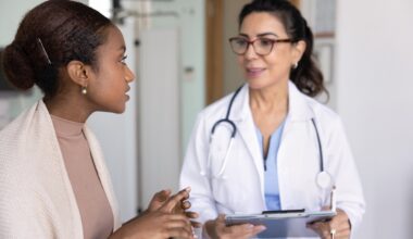 Doctor discussing Mounjaro (tirzepatide) dosing options with a patient during a clinical visit, representing guidance on dose escalation, safety, and personalized weight loss or diabetes treatment.