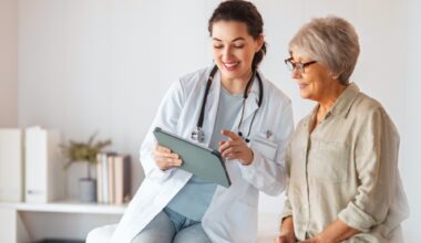 Doctor speaking to a patient. They are explaining longevity treatments and how they work.