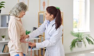 Woman speaking with a doctor about her weight loss. Learning about the FDA approved wegovy pill