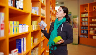 Woman looking at different medication. Debating switching from Zepbound to Wegovy