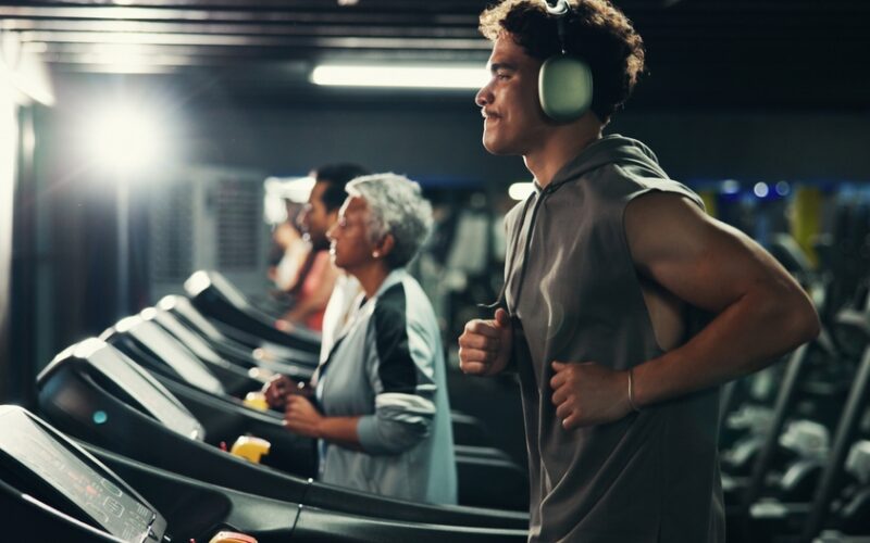 A group of people running on a threadmill. The man is an athlete using sermorelin for his training