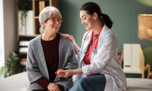 Doctor speaking to a patient. They are going over the side effects of wegovy and how to look out for red flags