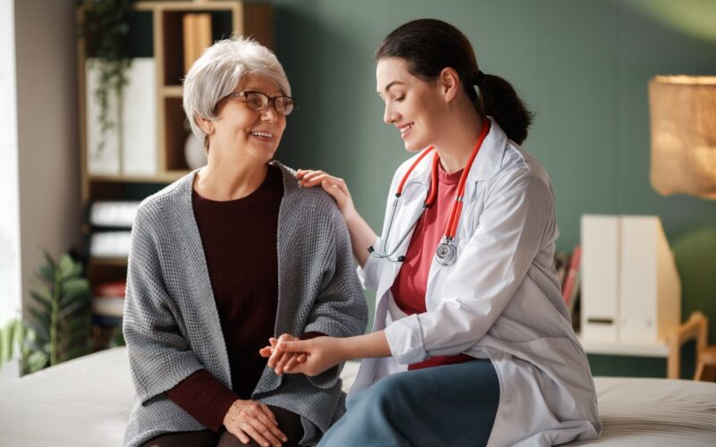 Doctor speaking to a patient. They are going over the side effects of wegovy and how to look out for red flags