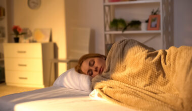 A woman getting a good nights rest when using NAD+ for improved sleep benefits.